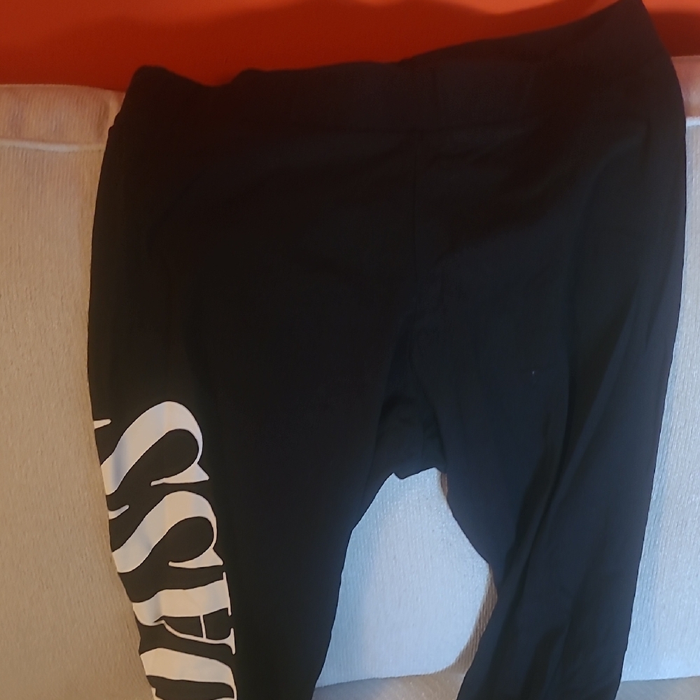 2 For $25 Torrid Black Leggings With Badass On Right Size